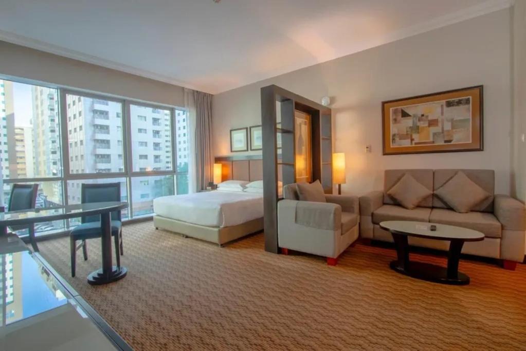 Al Manzel Hotel Apartments Abu Dhabi Exterior foto